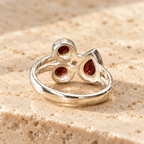 Three-stone garnet sterling silver ring, rear open setting