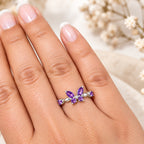 Amethyst butterfly ring worn on hand