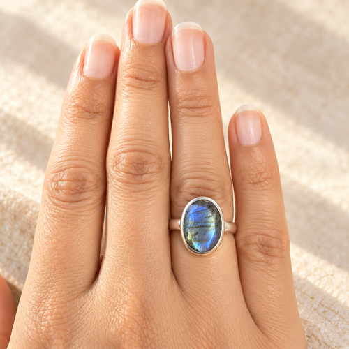 Labradorite cabochon ring worn on hand