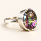 Three-quarter view of mystic quartz ring